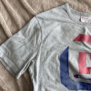 Champion Tee